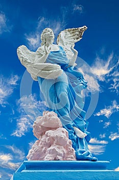 Angel statue among the Mausoleums and Crypts at North Cemetery photo