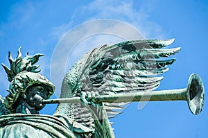 Angel statue playing the trumpet