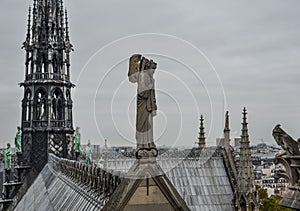Angel statue on the top of Notre Dame de Paris