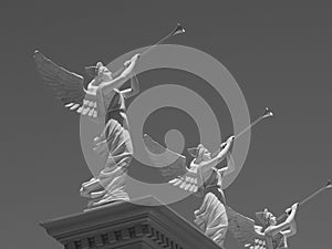 Angel Statues Blowing Trumpets