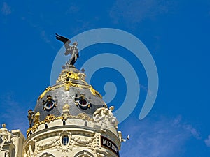 Angel on top of the Metropolis building, Madrid