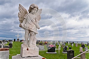 Angel under storm clouds