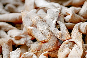 Angel wings called in Poland faworki or chrust  cakes deep fried in oil to celebrate Fat Thursday.