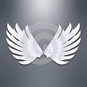 Angel wings, realistic angel wings with shadow on a gray background. Vector, cartoon illustration.