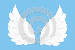 Angel wings white in cartoon style isolated on blue background, design element for decoration.