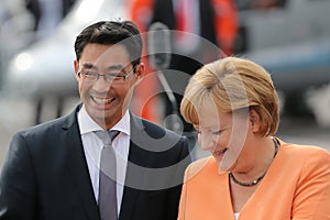 Angela Merkel and Philipp RÃÂ¶sler