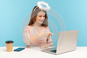 Angelic beautiful happy woman with halo, nimbus on head, talking on video call with boyfriend