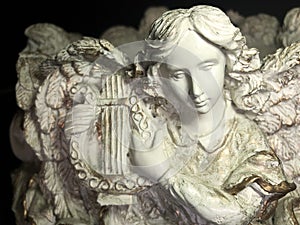 Angelic lyre player in performance