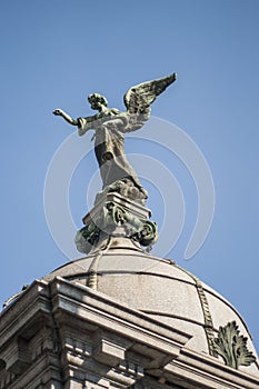 Angelic monument with blue sky