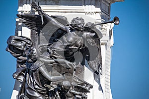 Angels blowing horn on Samuel de Champlain Statue in Quebec City Canada