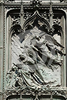 Angels, detail of the main bronze door of the Milan Cathedral