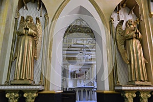 Angels at the entrance to a prayer room in a Catholic church