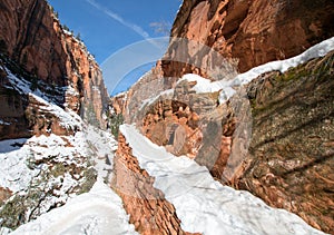 Angels Landing Hiking Trail switchbacks in snow during winter in Zion National Park in Utah