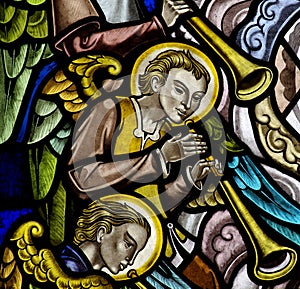 Angels making music in stained glass