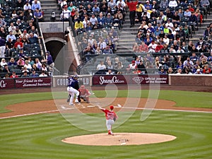 Angels pitcher Andrew Heaney throws pitch to Rockies batter Carl