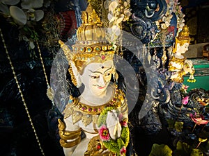 Angels Press The Hands Together at The Chest under Base of The White Buddha