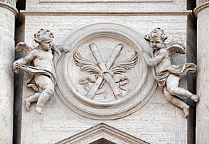 Angels with symbols of martyrdom