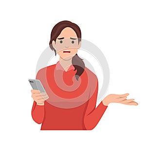 Anger frustration confusion concept. Nervous girl looking at smartphone screen. Furious teenager irritated with phone malfunction