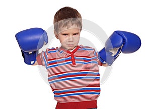 Anger little boy with boxing gloves