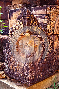 Angkor Cambodia, carvings of naga on a corner block at the 10th century Banteay Srei temple