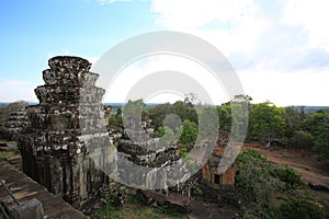Angkor ruins in cambodia with the skyï¼ŒPhnom Bakheng