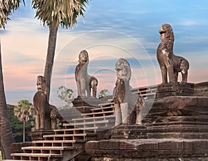 Angkor statues on the stairs, Cambodia