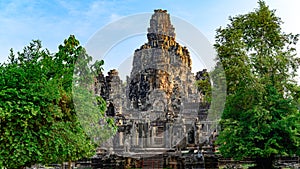 Angkor Thom, Khmer Temple, Siem Reap, Cambodia. It is famous because of the oversized smiling faces of the multi-headed statues