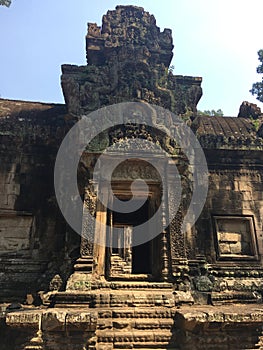 Angkor Wat in Siem Reap, Cambodia. Ancient Khmer stone temple ruins in jungle forest