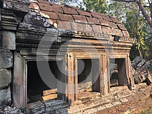 Angkor Wat in Siem Reap, Cambodia. Ancient Khmer stone temple ruins in jungle forest