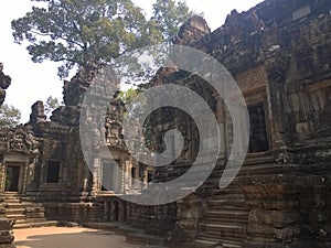 Angkor Wat in Siem Reap, Cambodia. Ancient Khmer stone temple ruins in jungle forest