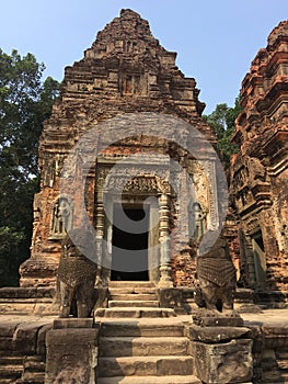 Angkor Wat in Siem Reap, Cambodia. Ancient Khmer stone temple ruins in jungle forest