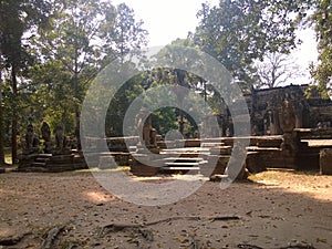 Angkor Wat in Siem Reap, Cambodia. Ancient Khmer stone temple ruins in jungle forest