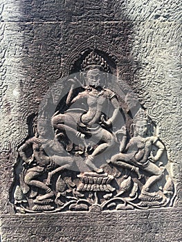 Angkor Wat in Siem Reap, Cambodia. Apsara carved on the wall of Khmer ancient temple