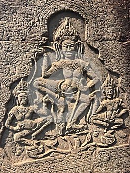 Angkor Wat in Siem Reap, Cambodia. Apsara carved on the wall of Khmer ancient temple