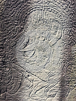 Angkor Wat in Siem Reap, Cambodia. Apsara carved on the wall of Khmer ancient temple