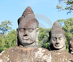 Sculptural stone group of guard soldiers at the gates of the ancient Angkor Wat is a temple complex in Cambodia