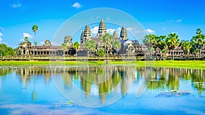 Angkor Wat temple and palms reflection, Cambodia