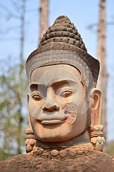 Angkor Watt Stone statue of the Khmer Empire and the delicate ruins of Angkor