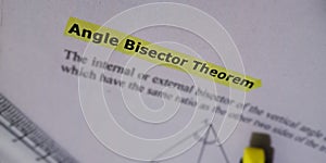 angle bisector theorem presented word on white paper sheet with highlights