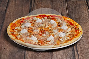 Angle side view of pizza with mushrooms and mayonnaise sause