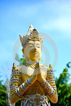 Angle statue in Public Buddhist temple are showing respect