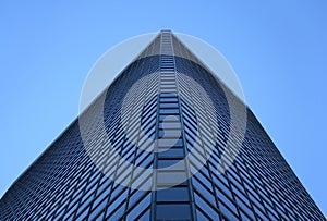 Angle view of a glass-windowed office tower