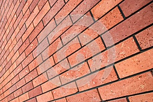 Angle view red brick wall