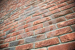 angle view of red brick wall , texture background