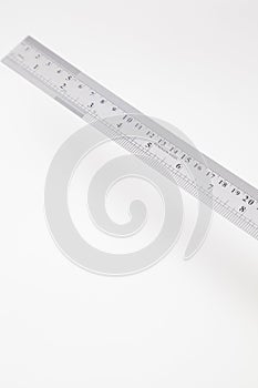 Angled stainless steel ruler with inches