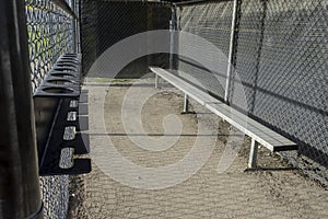 Angled view of the dugout on a baseball field, without any people around