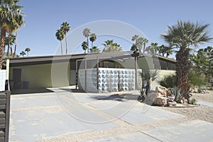 Angled View of Modern Home in Palm Springs with Pitched Roof and Front Patio photo