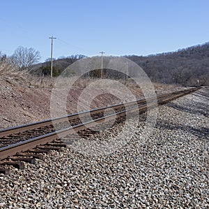 Angled view of railroad tracks in the country