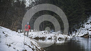 Angler on the bank of the spring river