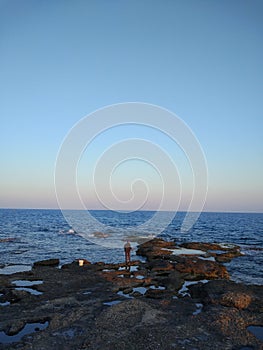 The angler at the beach